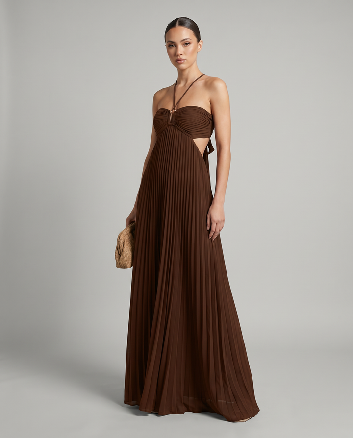 Sophisticated women's pleated maxi dress featuring a halter neck. Perfect chic party or wedding guest attire.