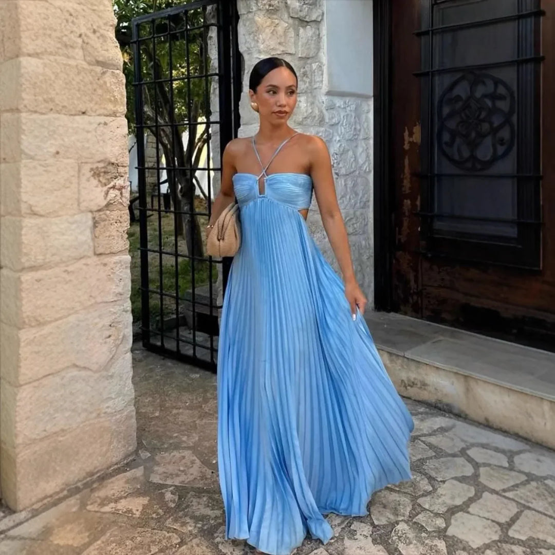 Stunning women's pleated halter neck maxi dress with open back detail. Elegant & chic for summer parties.