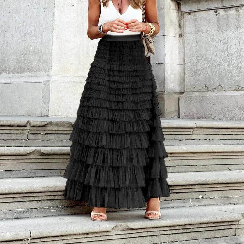 Versatile women's elegant pleated mesh midi skirt with ruffle, a must-have for modern wardrobes.