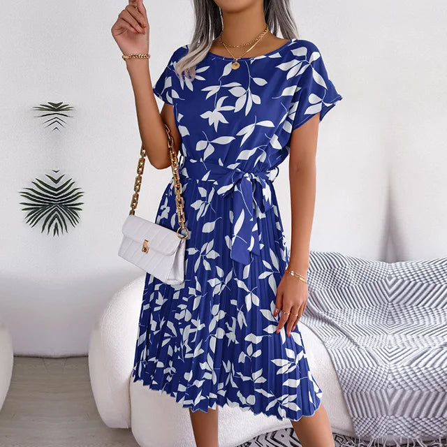 Versatile women's elegant pleated midi dress with short sleeves & waist tie for diverse occasions.