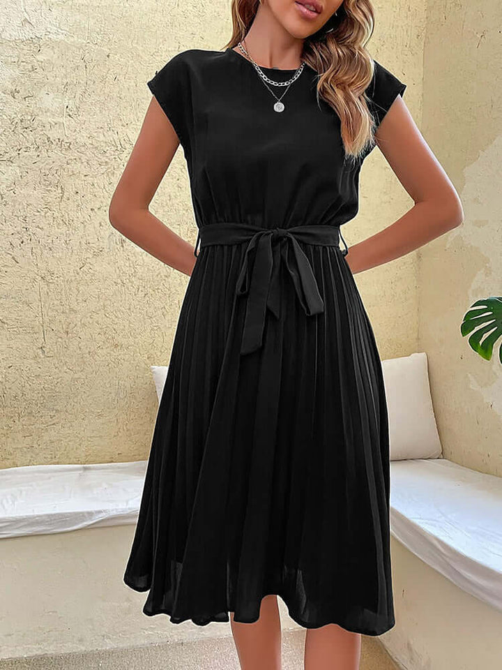 Elegant women's pleated midi dress with stylish tie waist, perfect for spring & summer fashion.