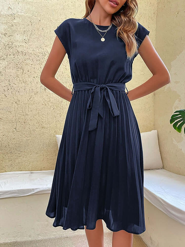 Stylish women's spring midi dress, pleated design, and flattering tie waist, great for elegant looks.