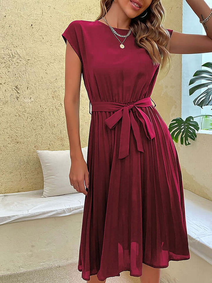 Classic women's pleated midi dress, perfect as a versatile party or casual dress with a tie-waist.