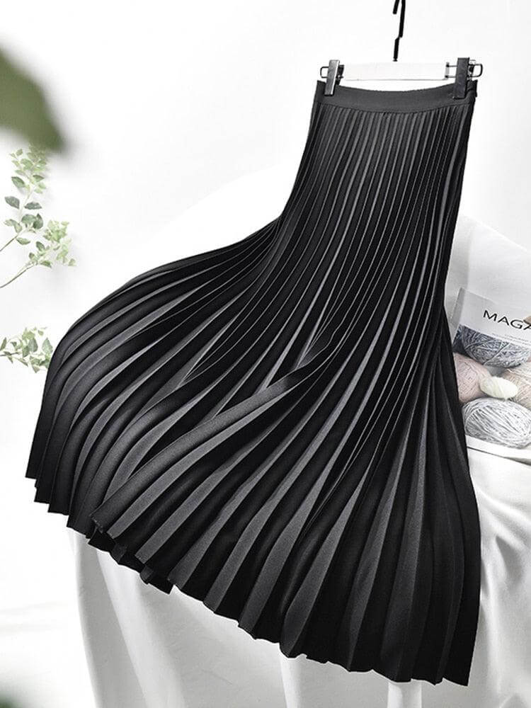 Versatile pleated midi skirt for women, flowy and high-waisted, ideal for casual spring & summer fashion.