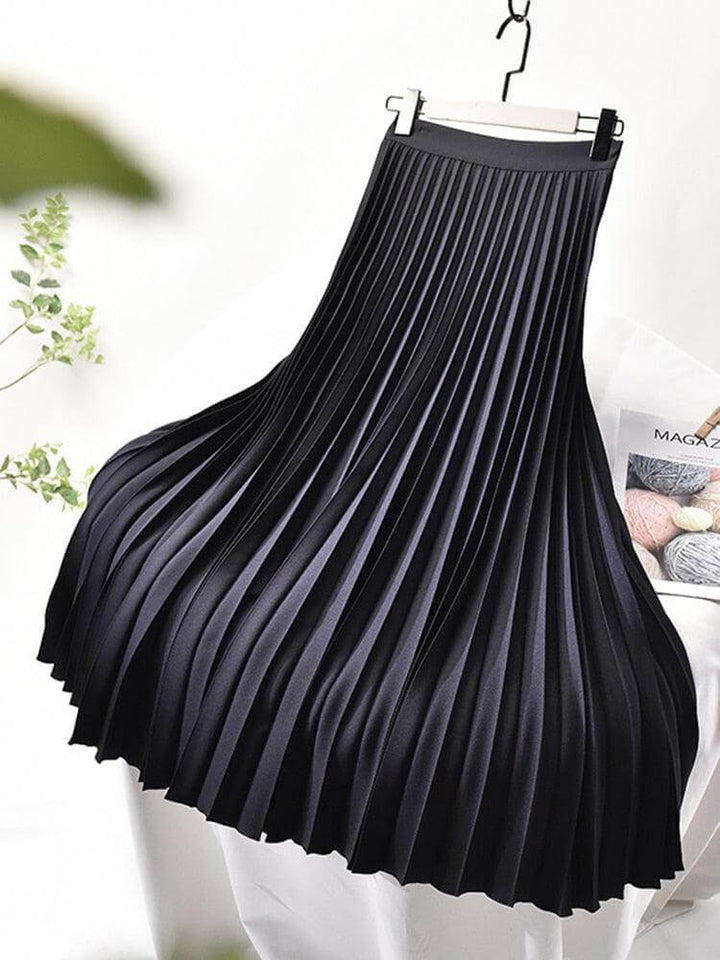 Flowy women's pleated midi skirt, chic and elegant, offering modest and comfortable ladies apparel.
