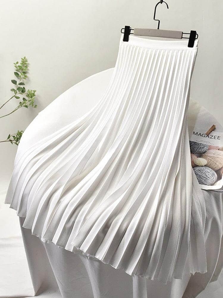 Women's high-waisted pleated midi skirt in a flowy elegant design, suitable for versatile ladies fashion.