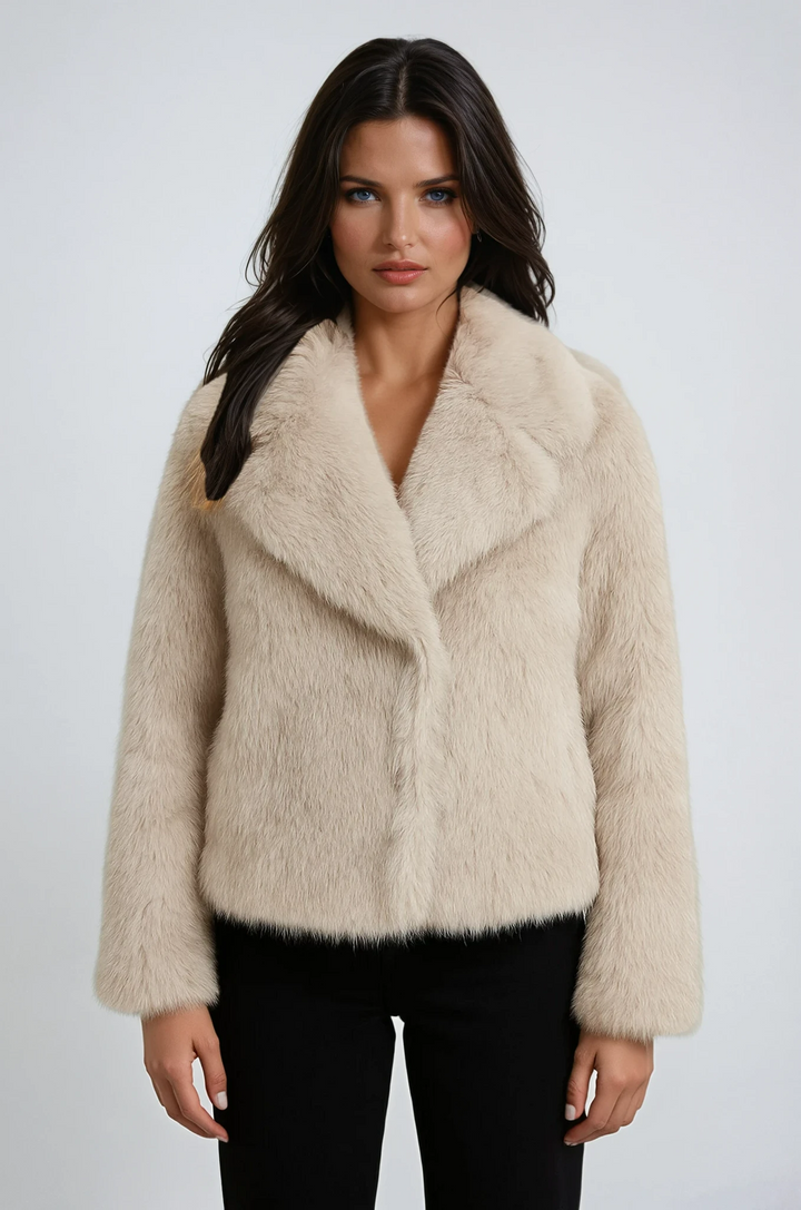 Elegant women's plush winter coat in a luxurious design, perfect for warmth and stylish outerwear during cold seasons.