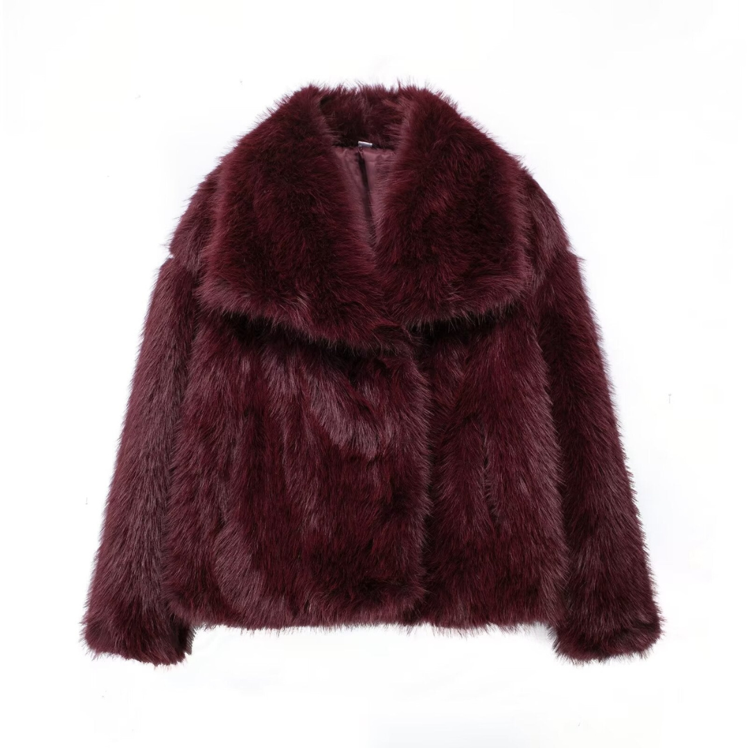 Warm and elegant women's plush winter coat, a luxurious long-sleeve outerwear piece for stylish cold-weather fashion.