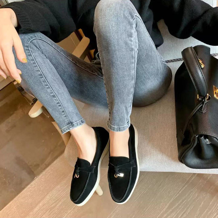 Chic women's pointed-toe loafers, providing effortless style and comfort for any spring outfit.