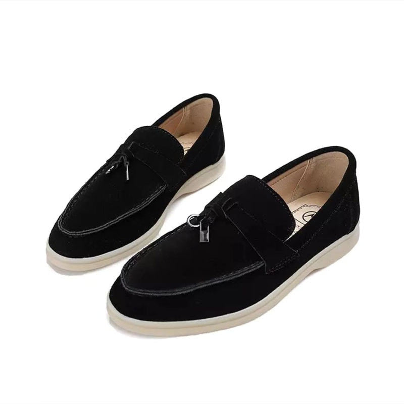 Classic women's pointed-toe loafers, sleek slip-on design for comfortable and elegant everyday style.