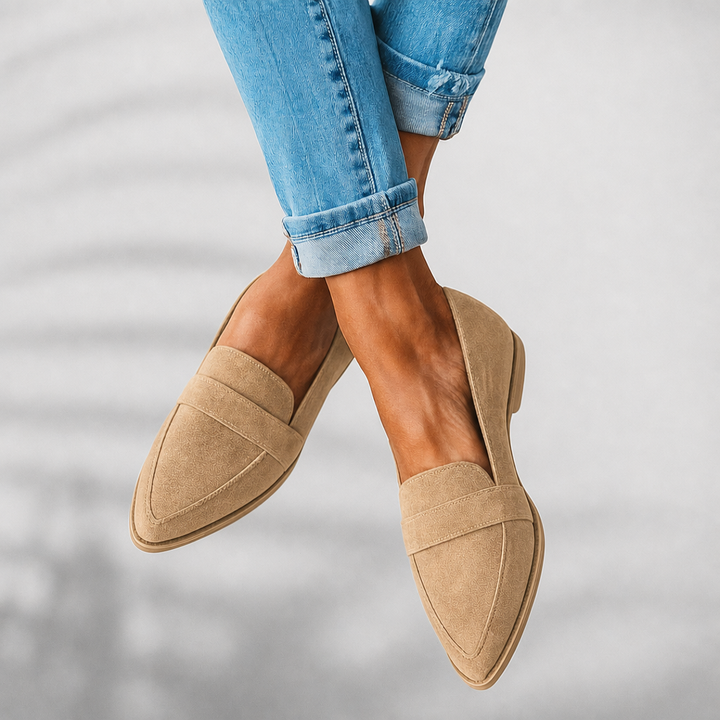 Stylish women's pointed toe flats; easy slip-on loafers offering elegant and comfortable everyday footwear.