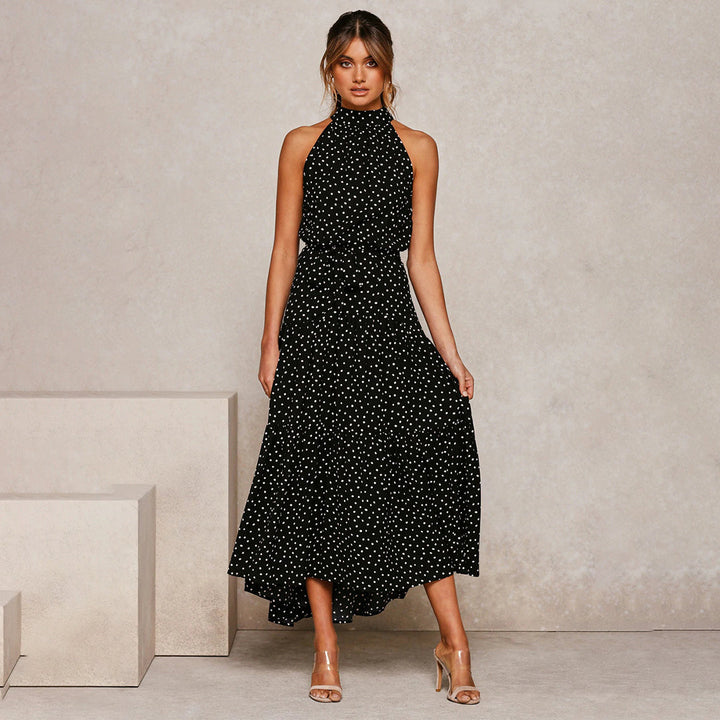 Elegant women's polka dot halter neck maxi dress, perfect for summer parties & vacations.