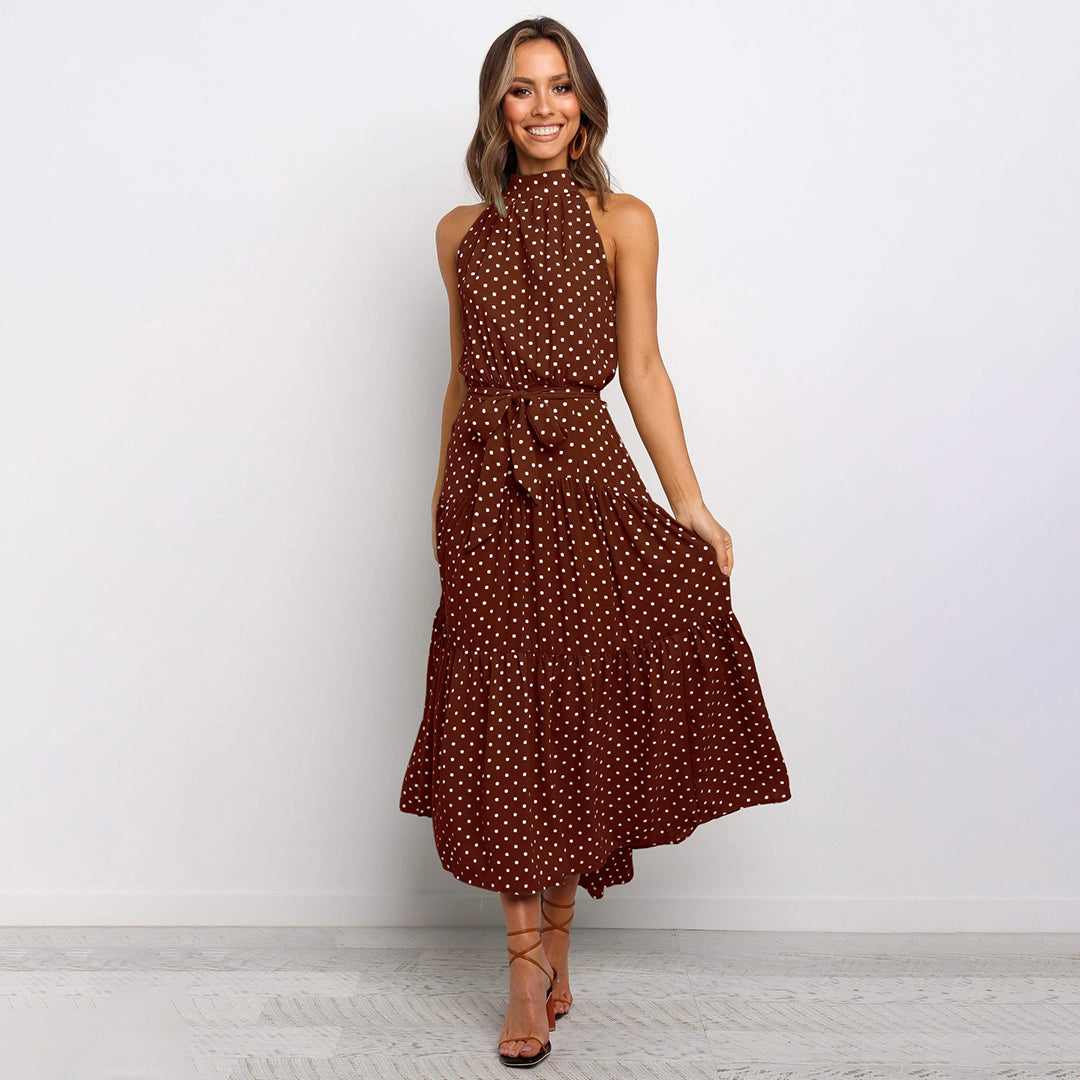 Vacation-perfect women's elegant polka dot halter neck maxi dress, flowy and chic for summer.