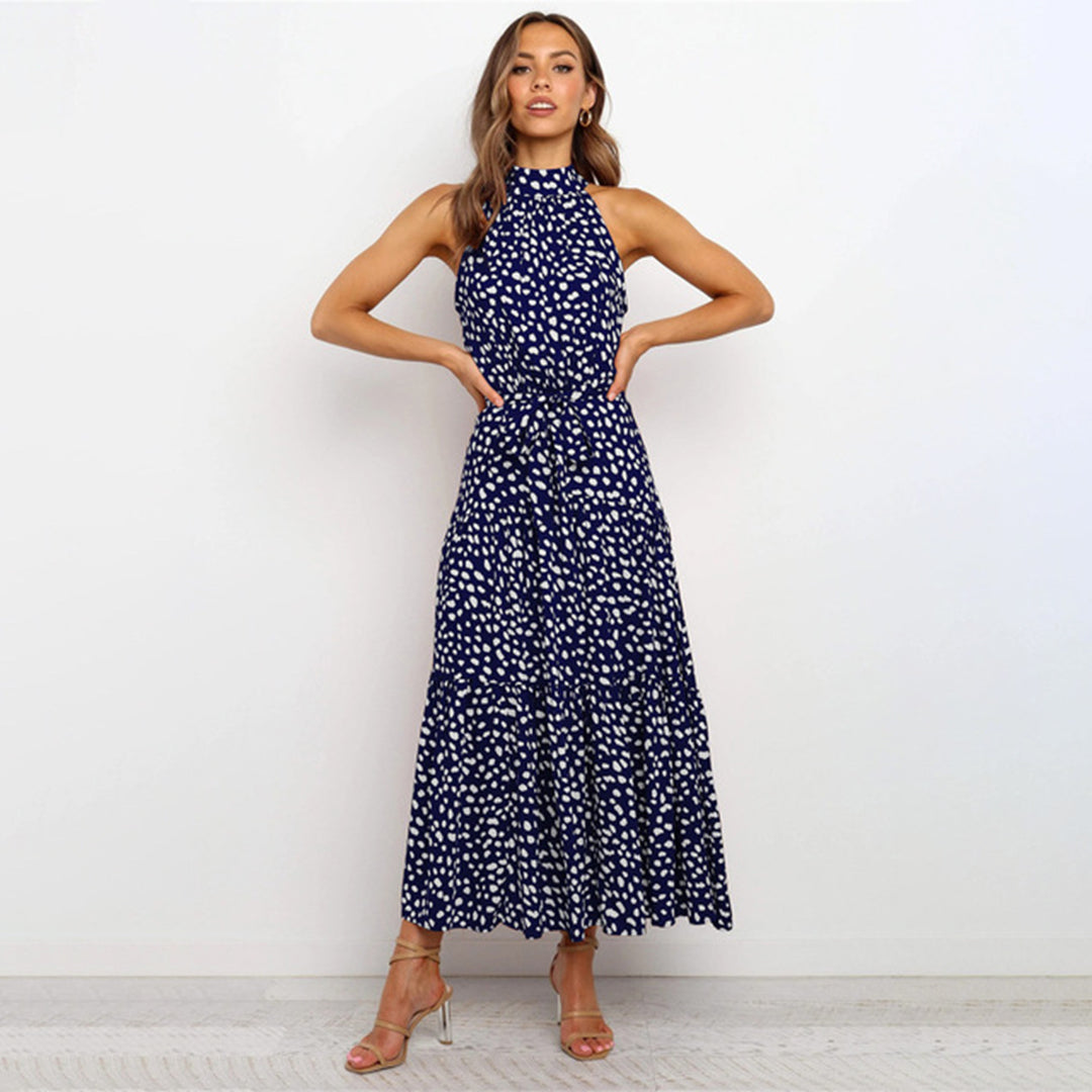Versatile women's polka dot halter maxi dress, chic for summer casual & party.