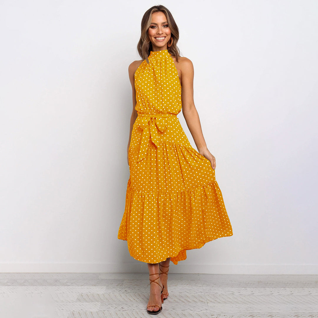 Chic polka dot halter neck maxi dress for women, perfect for elegant summer vacation.