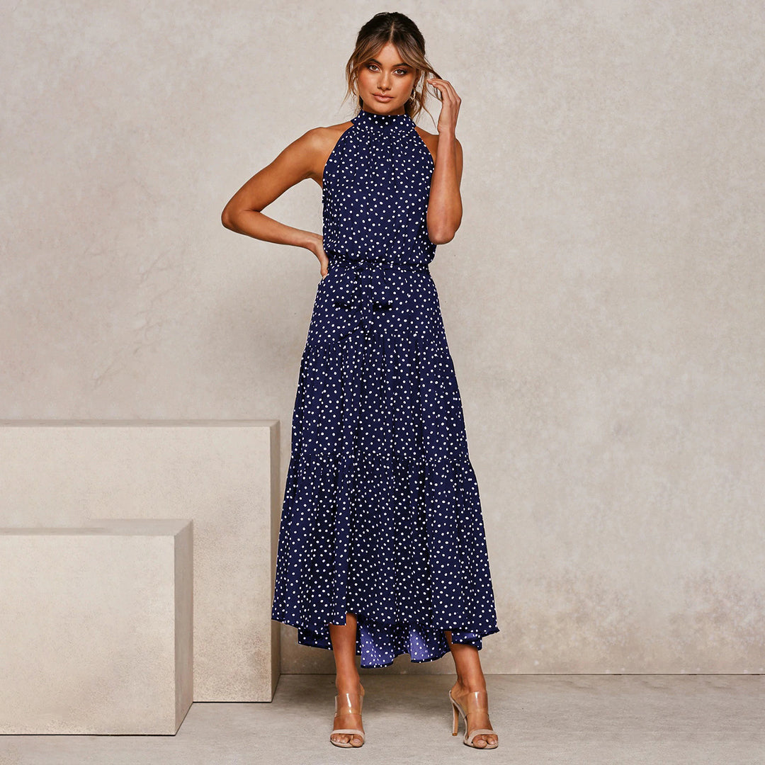 Casual elegant women's polka dot halter maxi dress with a comfortable, flowy fit.