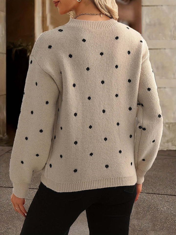 Women's cozy elegant polka dot sweater. Stylish knitted long sleeve for autumn and winter outfits.