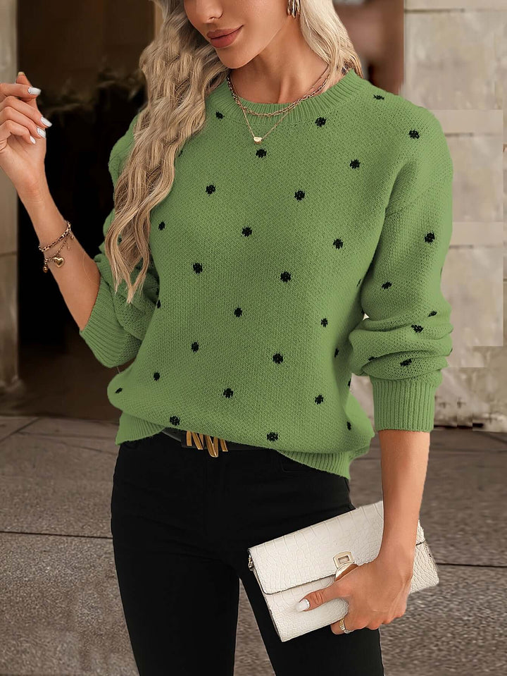 Cozy women's knitted polka dot sweater. Elegant long sleeve autumn/winter casual wear.
