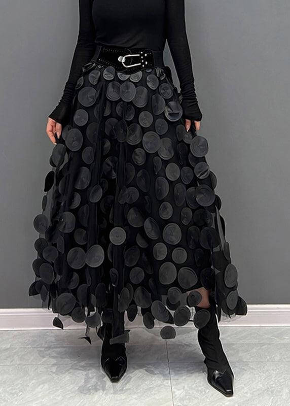 Elegant women's polka dot tulle midi skirt. A-line design, versatile for spring/fall fashion.