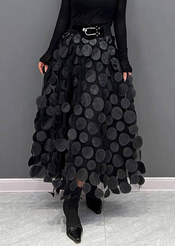 Women's elegant midi skirt with black polka dots on sheer tulle. Versatile A-line fashion.