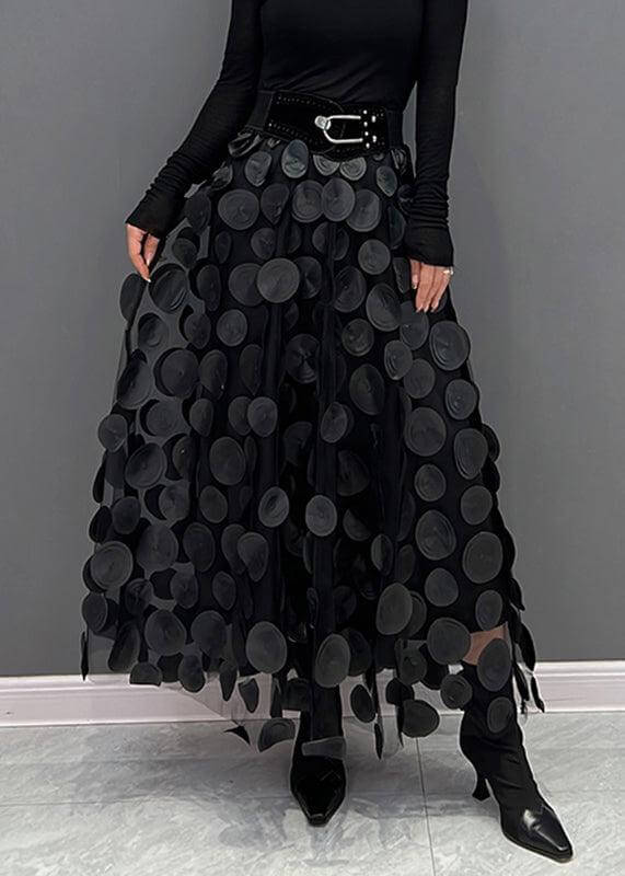 Versatile women's midi tulle skirt featuring elegant polka dot pattern. Trendy spring/fall fashion.