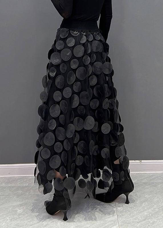 Stylish women's A-line midi skirt with sheer polka dot tulle. Feminine and versatile fashion.
