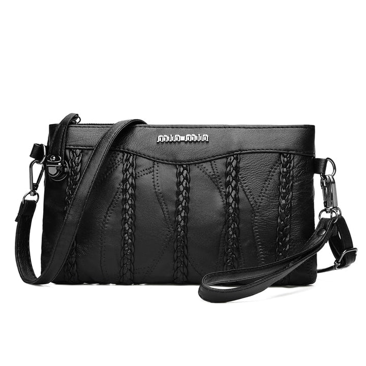 Elegant women's PU leather crossbody clutch with spacious interior, perfect for daily and evening carry.