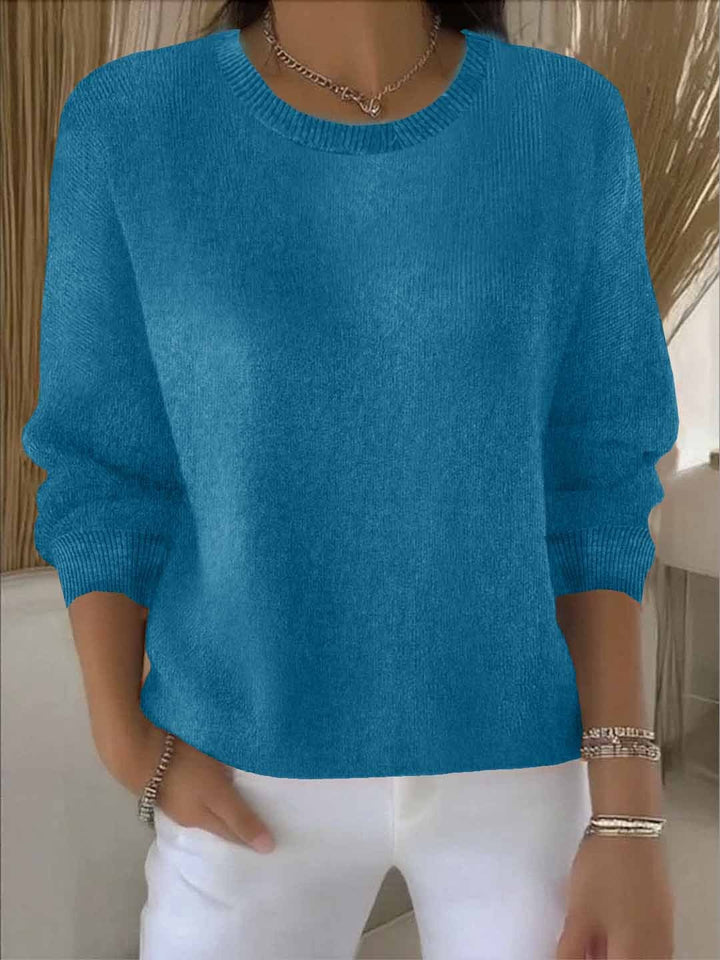Sophisticated women's sweater offering cozy comfort & chic versatile style.
