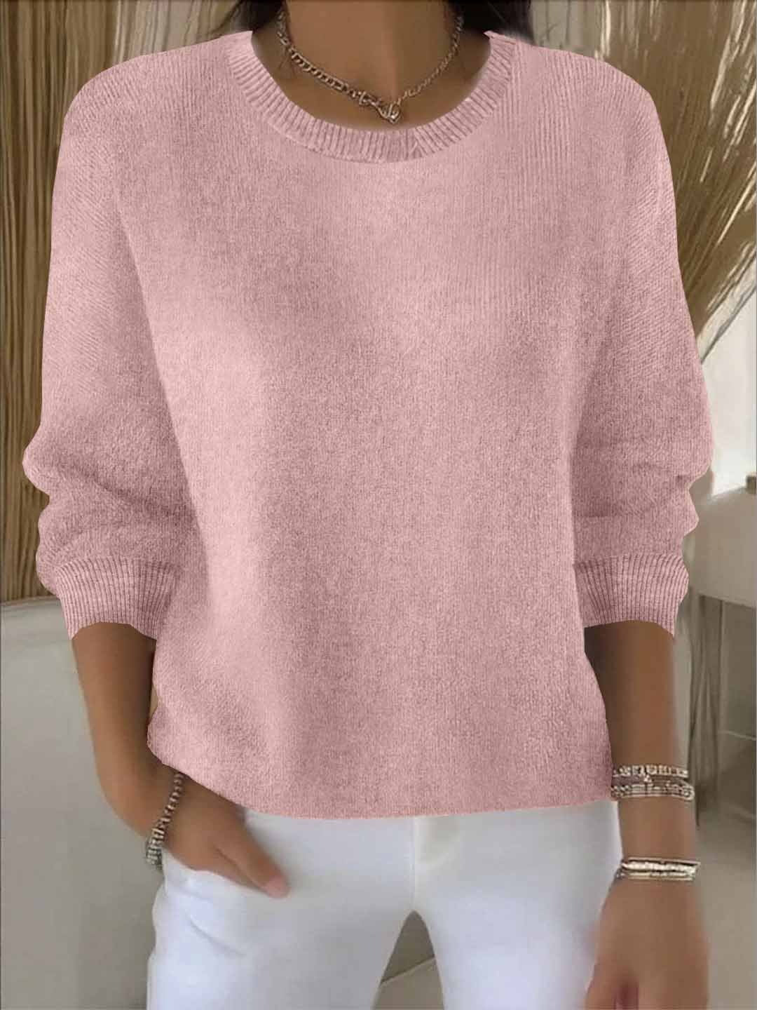 Elegant knit sweater for women, a cozy and sophisticated pullover for winter comfort.