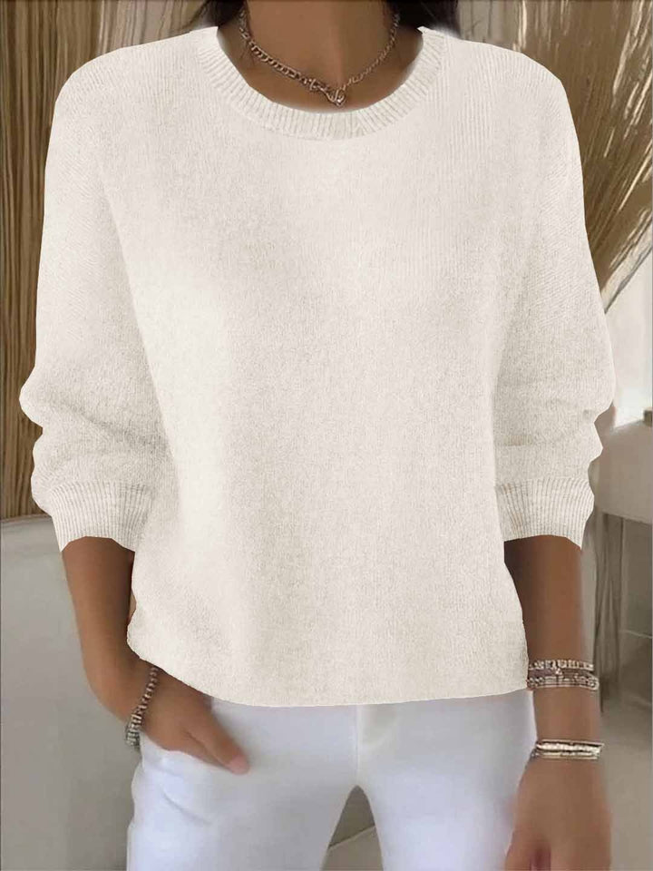 Women's sophisticated & elegant sweater, offering cozy comfort for autumn & winter style.