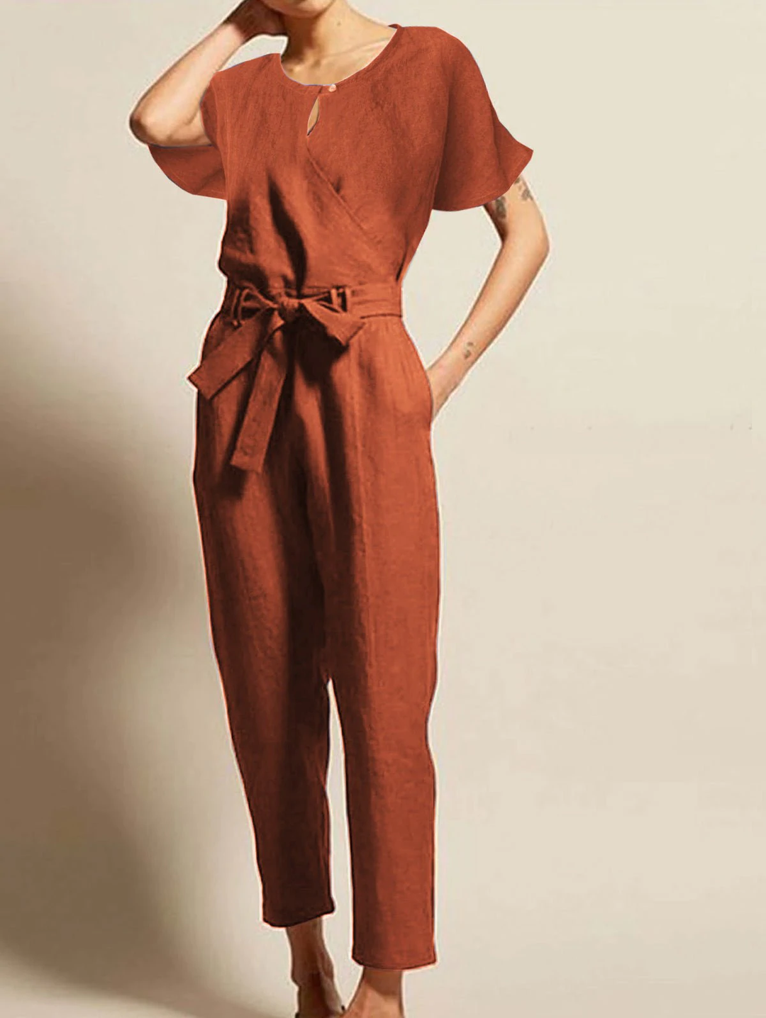 Elegant women's radiant summer jumpsuit with short sleeves & belt. Perfect for casual wear or day-to-night trendy fashion.
