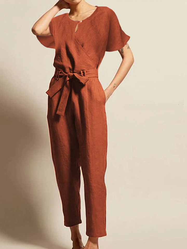 Elegant women's radiant summer jumpsuit with short sleeves & belt. Perfect for casual wear or day-to-night trendy fashion.