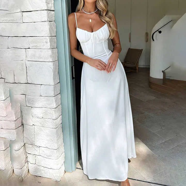 Sleeveless ruched maxi dress for women, an elegant choice for wedding guests and special occasions.