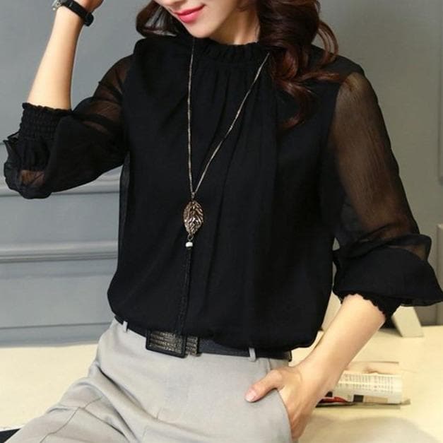 Stylish women's ruffle blouse with sheer puff sleeves, an elegant & versatile top for spring, summer, and office.