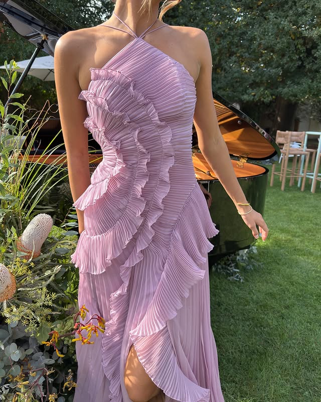 Beautiful women's ruffle halter maxi dress, a perfect choice for chic summer fashion and events.