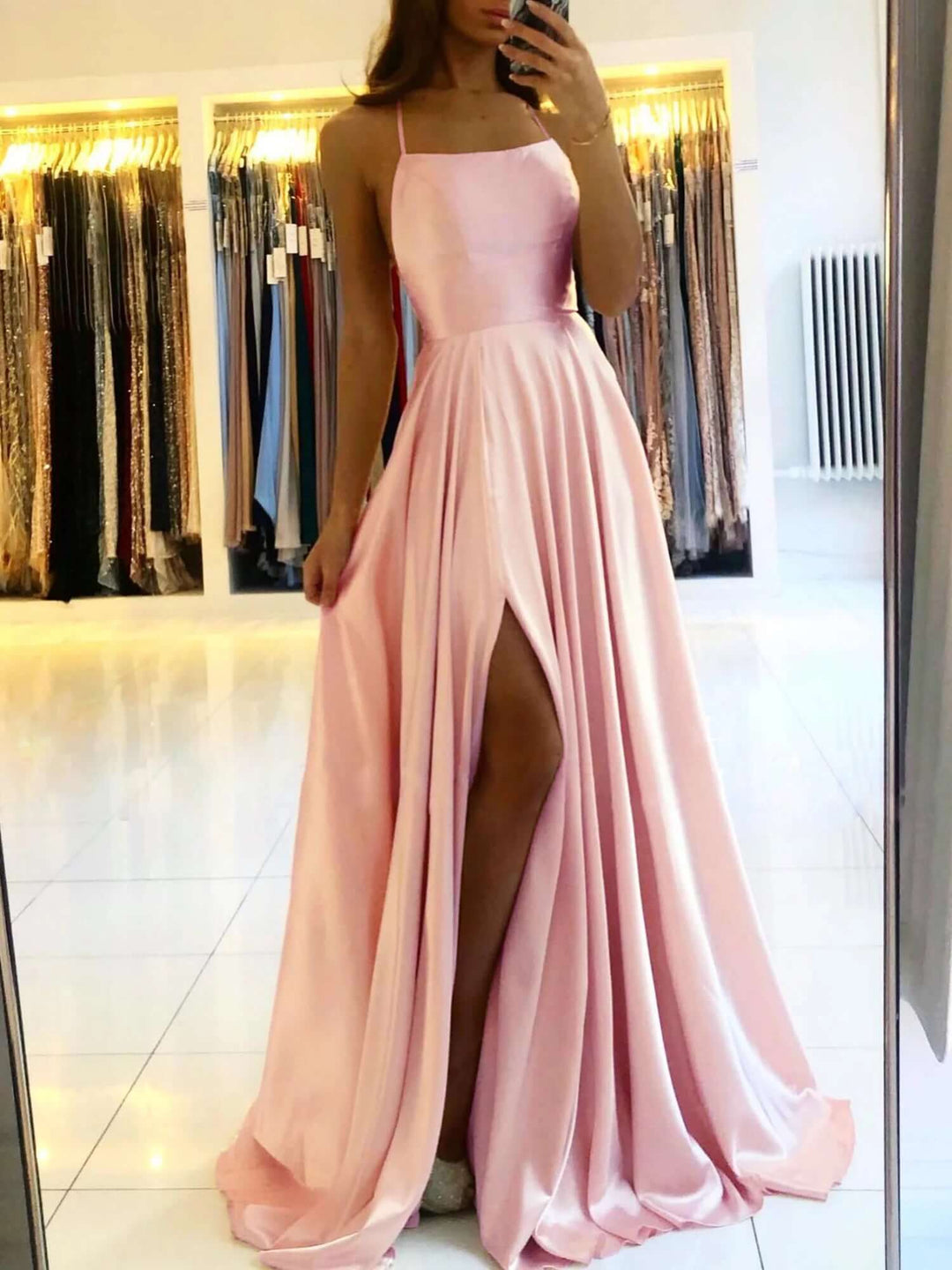 Long A-line women's formal dress in elegant satin with a sophisticated high slit, ideal for evening parties.