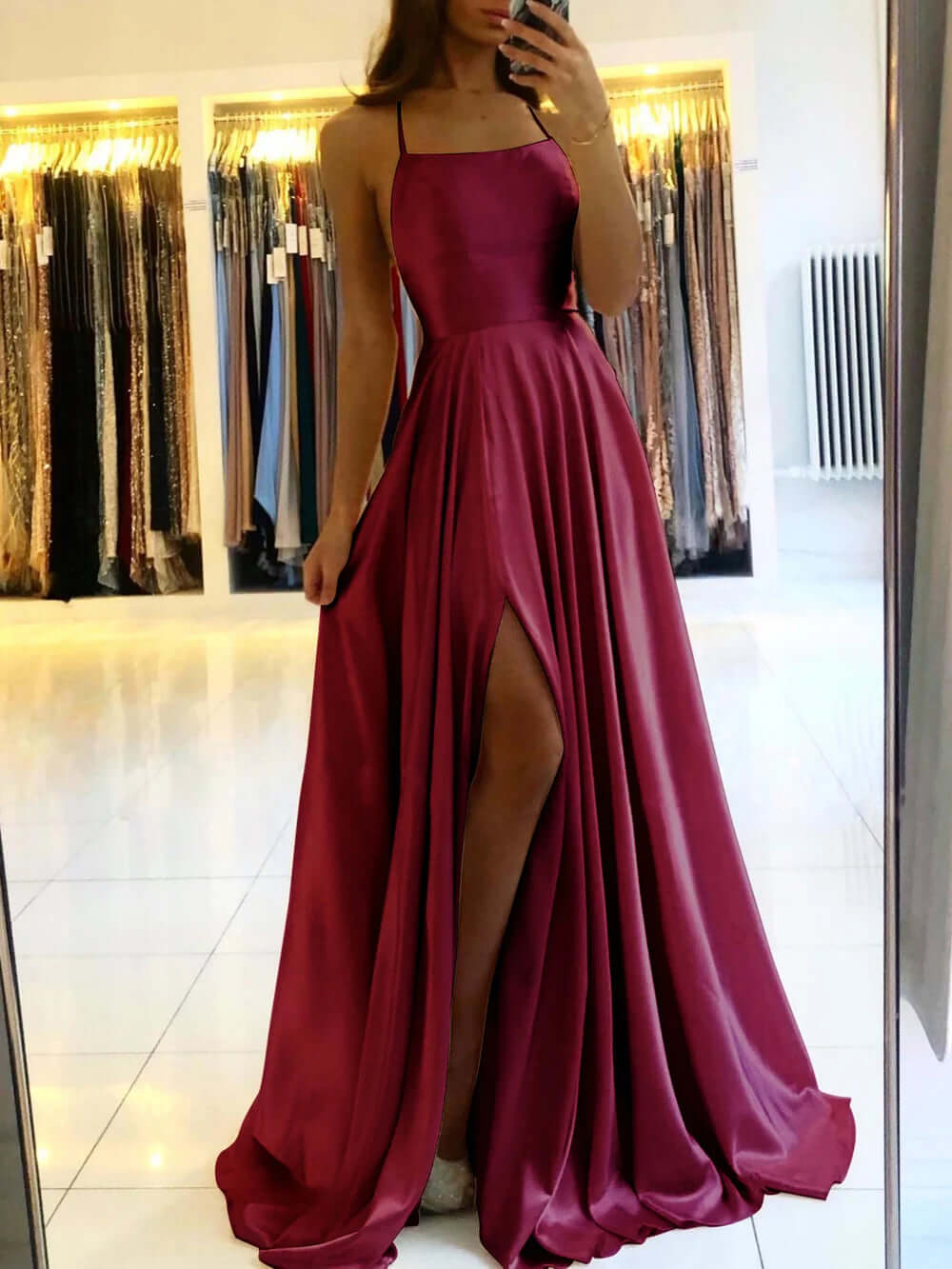 Luxurious women's satin formal dress with a high slit, an elegant choice for evening galas and special events.