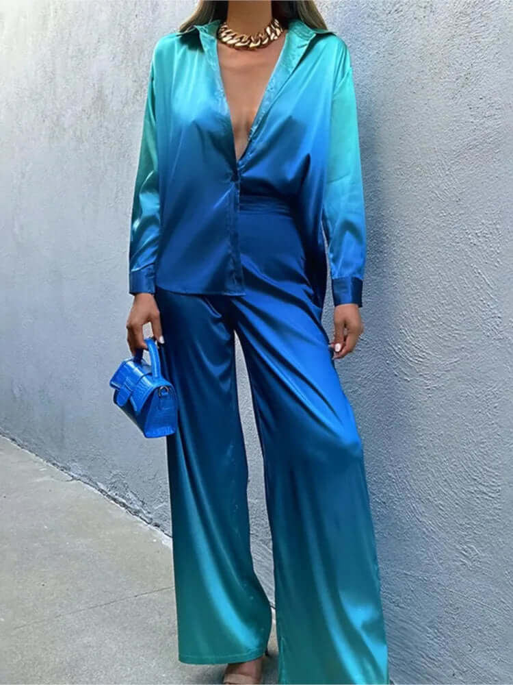 Chic & comfortable women's wide-leg satin-feel jumpsuit, featuring long sleeves, ideal for elegant day or evening fashion.