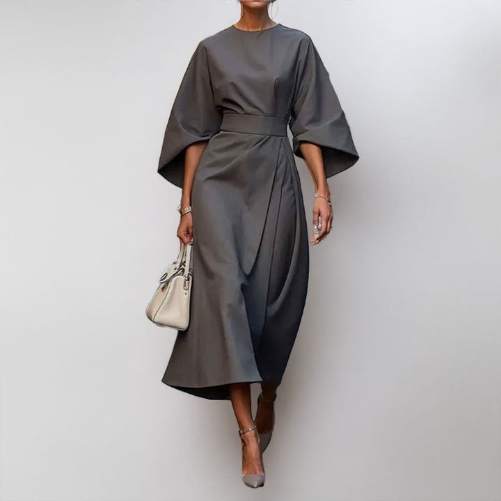 Graceful women's satin batwing sleeve maxi dress, a long elegant gown with a beautiful draped silhouette.