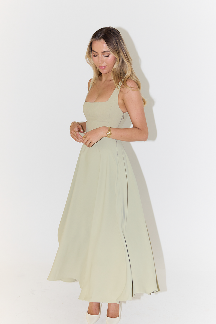 Sleek women's satin midi dress with an elegant square neck, ideal as a party dress or formal evening gown.