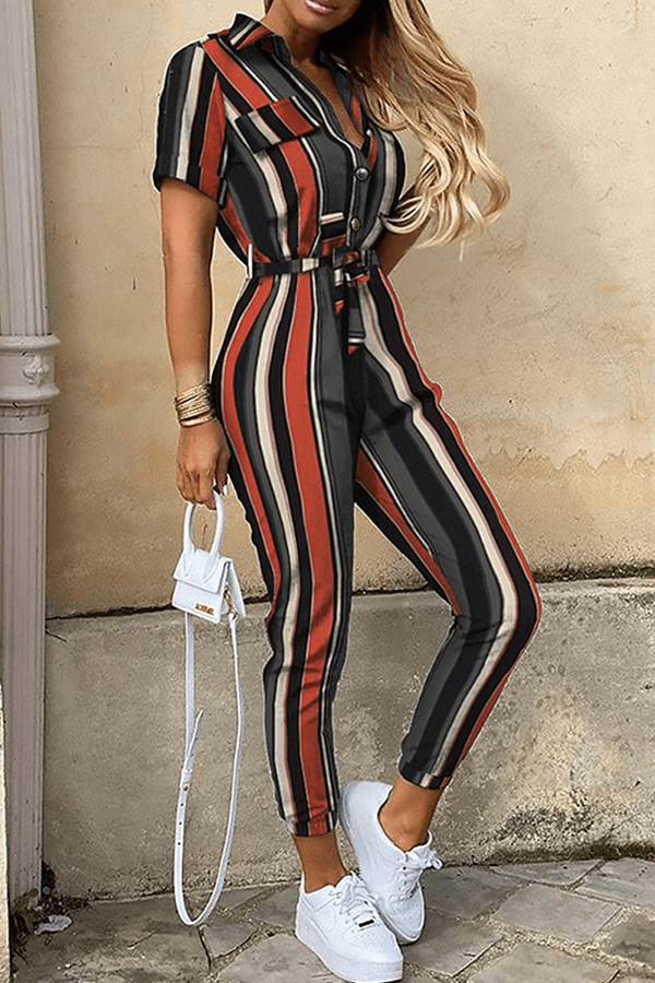 Modern women's one-piece jumpsuit with a flattering shawl collar and belt. Great for occasion wear.