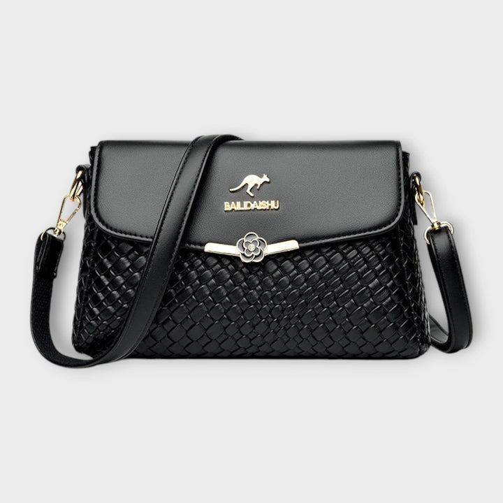 Elegant women's shoulder bag in black, perfect for everyday style. Versatile and fashionable handbag accessory.