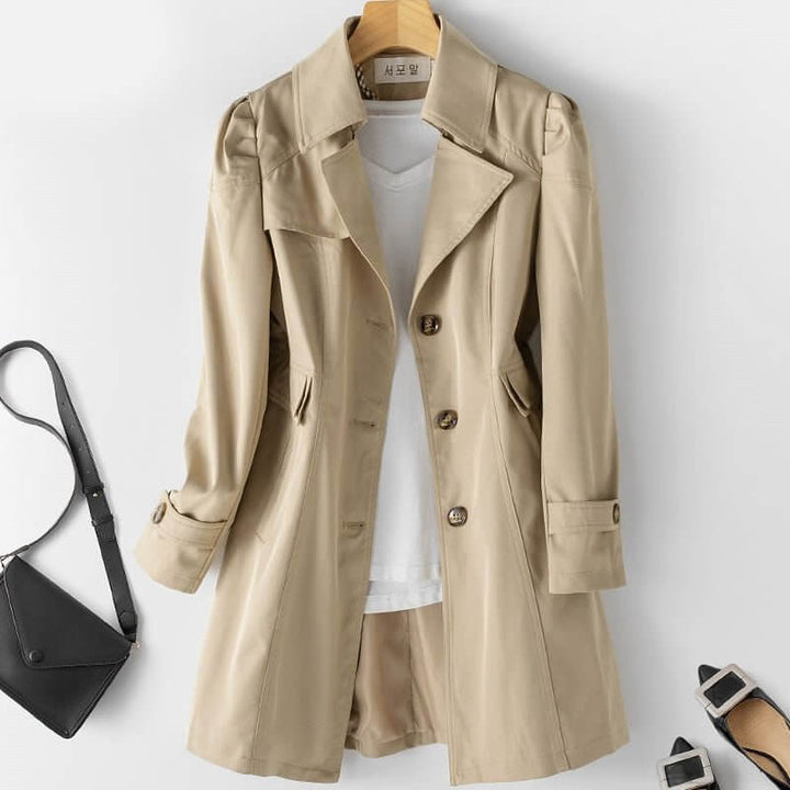 Tailored single-breasted women's trench coat, a chic and elegant long jacket for fashionable spring & fall.
