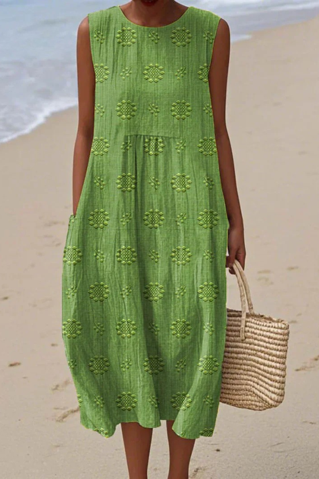 Elegant women's sleeveless dress with intricate floral embroidery, perfect for spring/summer special occasions.