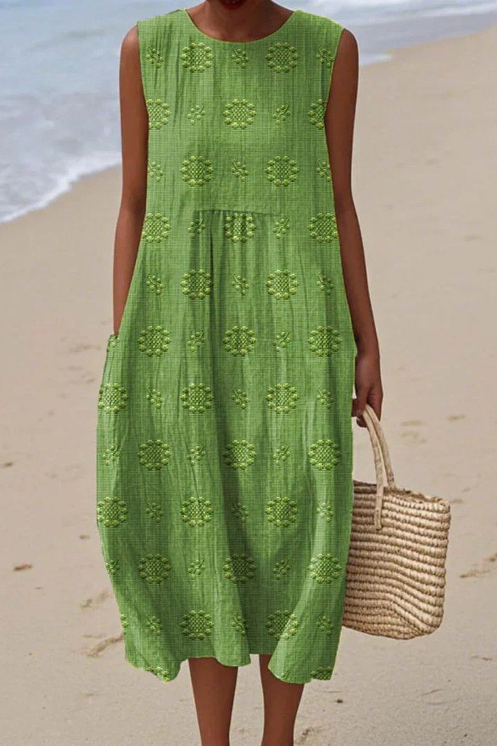 Elegant women's sleeveless dress with intricate floral embroidery, perfect for spring/summer special occasions.