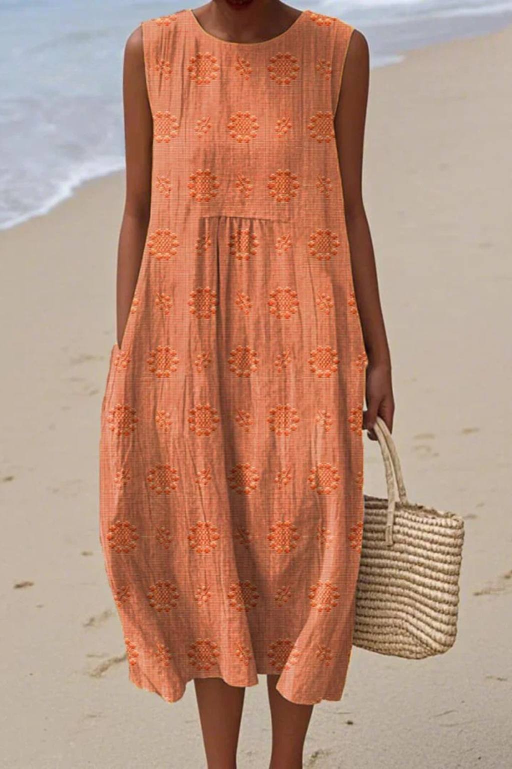 Beautiful women's sleeveless embroidered summer dress, flowing A-line design for effortless chic style.