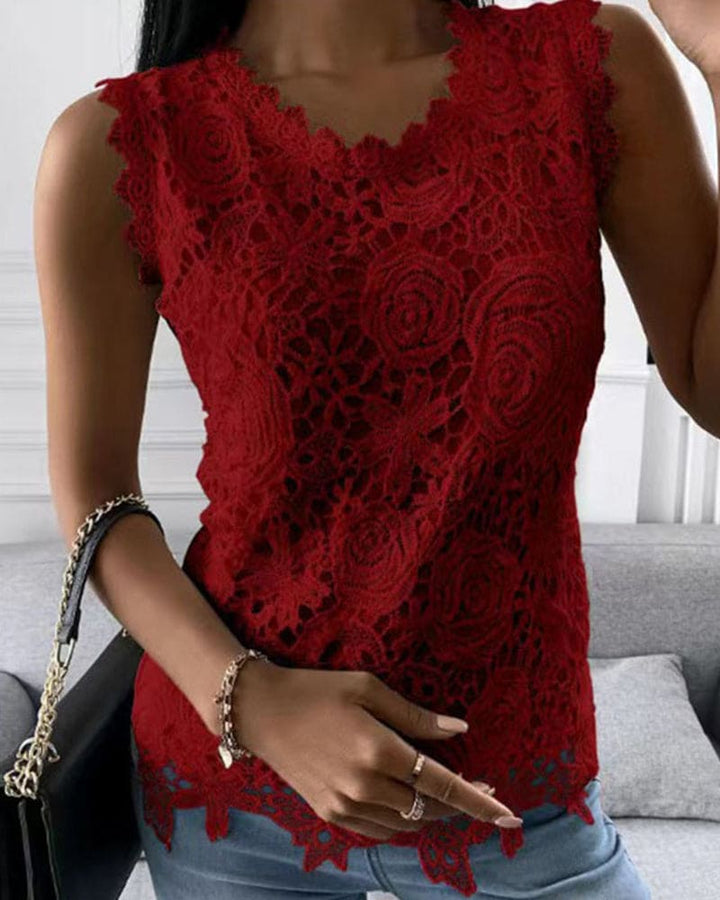 Stylish ladies' sleeveless lace top in solid color. Elegant design for business, casual outfits, or summer events.