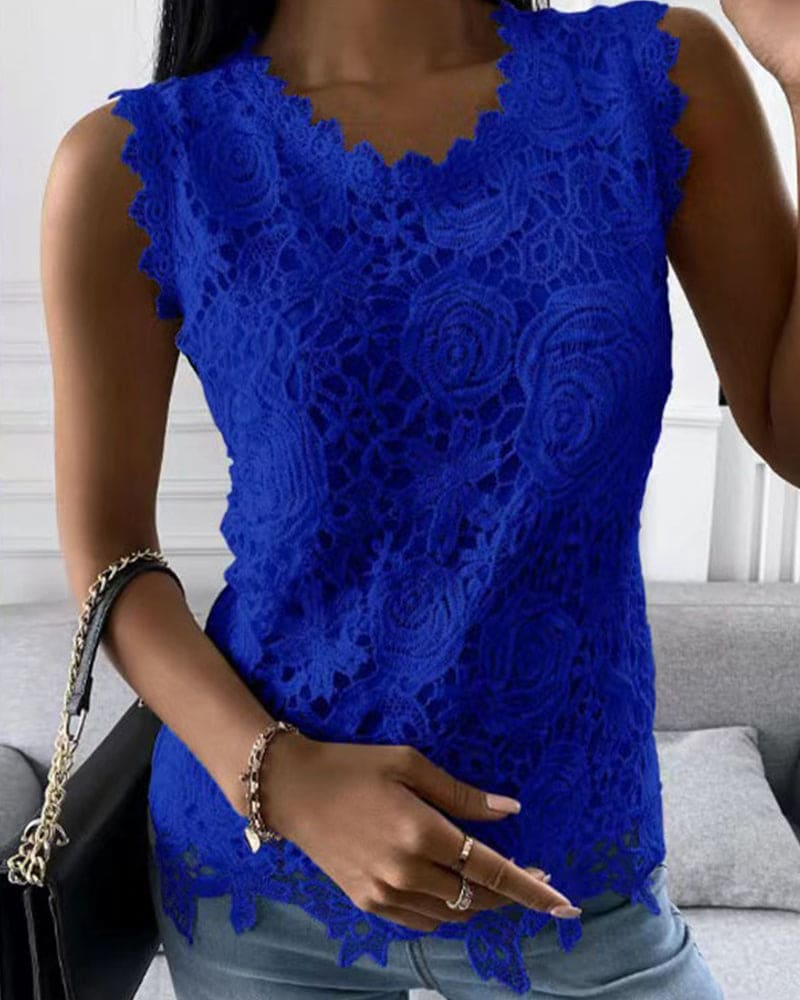 Sophisticated sleeveless women's blouse with elegant lace details. Great for business casual & chic summer fashion.
