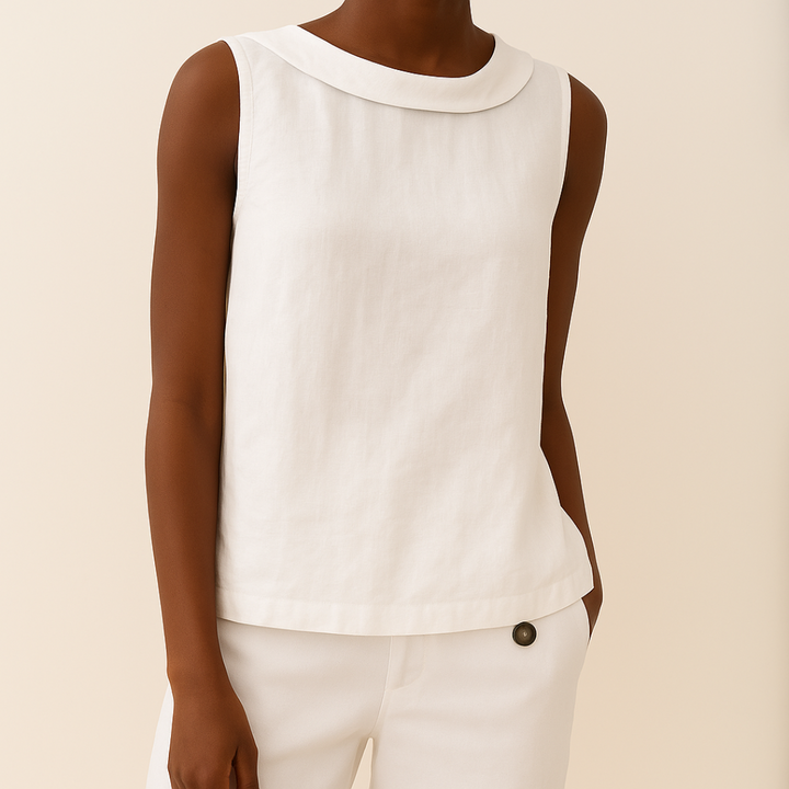 Stylish women's sleeveless top with a sophisticated roll collar, great for modern elegance.