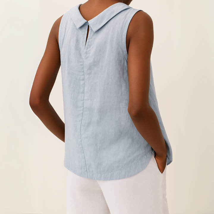 Dressy women's sleeveless roll collar top, creating an elegant and polished summer ensemble.